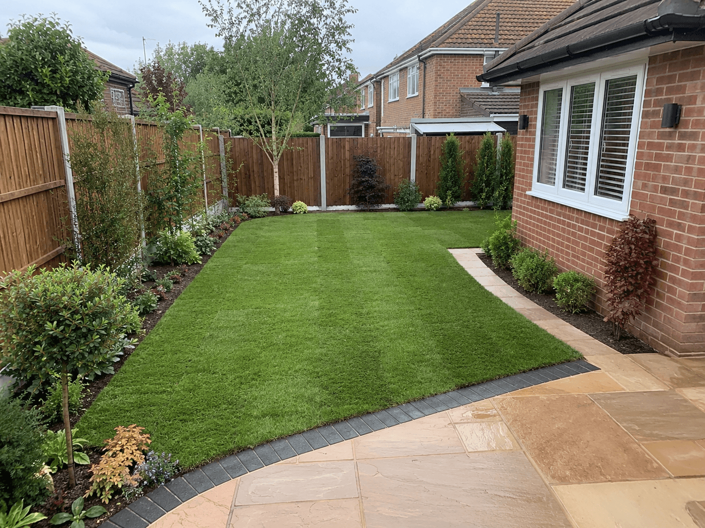 New lawn & planting scheme — Chelmsford · turf + borders — Summerfield Landscapes